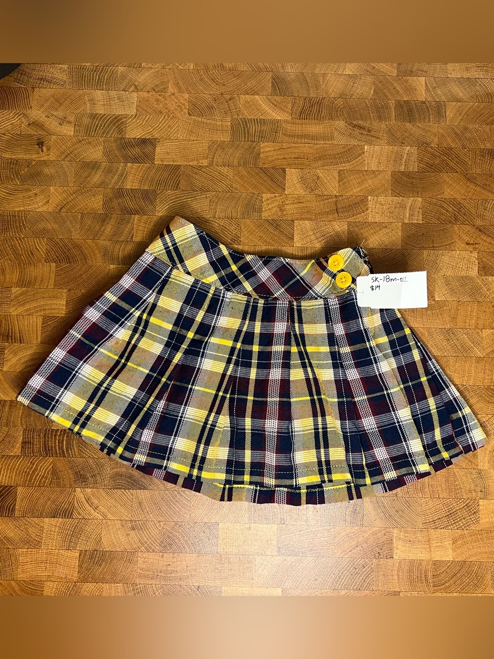 Plaid Pleated Mini Skirt with Yellow Button Detail